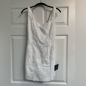 Lulu’s Sequin Mini Dress, a Small. Never been worn, tags still on.